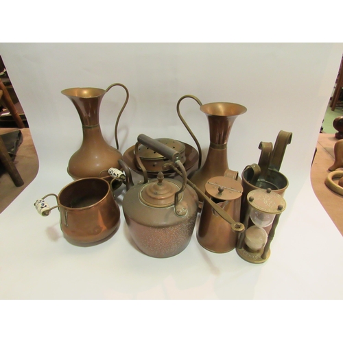 4299 - A quantity of mixed copper and brass wares including lidded jug