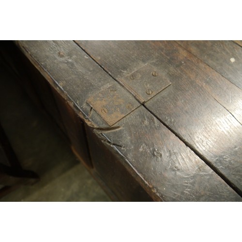 2203 - An 18th Century heavily carved oak three panel coffer  135cm (w)
66cm (h)
55cm (d)