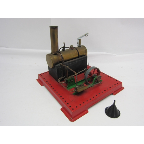 8454 - A Mamod live steam stationary engine, the brass horizontal boiler powering twin cylinder and flywhee... 