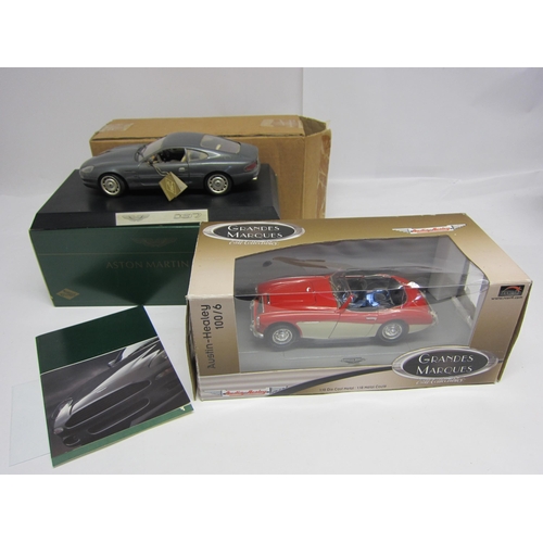 8189 - Two boxed 1:18 scale diecast cars to include Guiloy Aston Martin DB7 with paperwork and ERTL Grandes... 