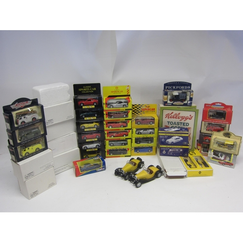 8151 - A collection of boxed diecast vehicles, predominantly 1:43 scale, including National Motor Museum Mi... 