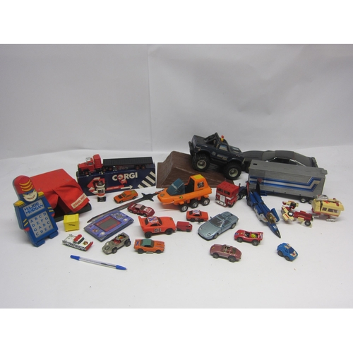 8148 - Assorted playworn vintage toys including Transformers, Gakken 'Tom & Jerry Popper' LCD game (missing... 