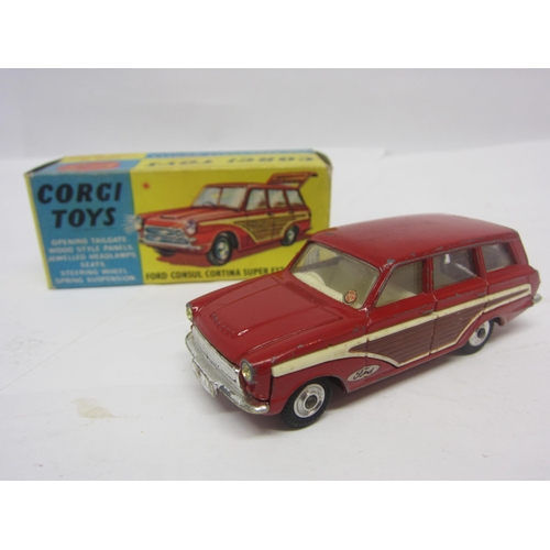 8138 - A boxed Corgi Toys 491 diecast Ford Consul Cortina Super Estate Car in red with white interior