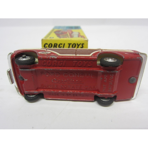 8138 - A boxed Corgi Toys 491 diecast Ford Consul Cortina Super Estate Car in red with white interior