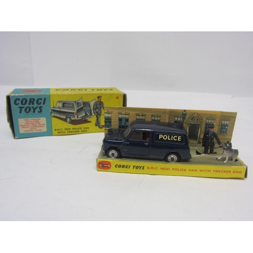 8133 - A boxed Corgi Toys 478 diecast BMC Mini Police Van with Tracker Dog, comprising dark blue police van... 