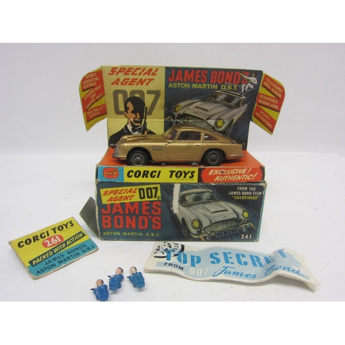 8132 - A boxed Corgi Toys 261 diecast James Bond Goldfinger Aston Martin DB5 in gold with red interior, wit... 