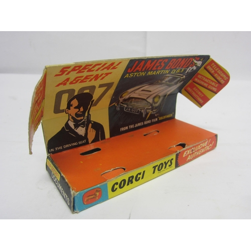 8132 - A boxed Corgi Toys 261 diecast James Bond Goldfinger Aston Martin DB5 in gold with red interior, wit... 