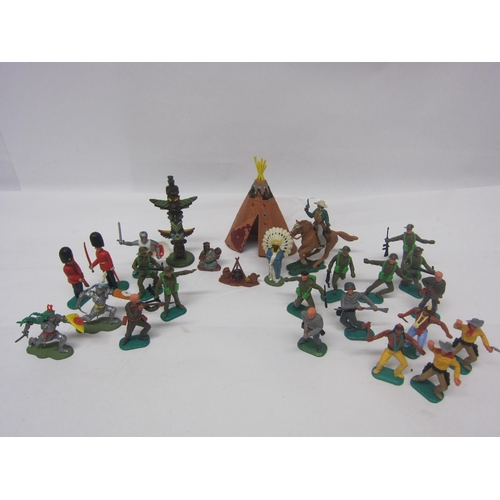 8377 - A collection of Timpo, Britains and Herald plastic figures including soldiers, cowboys, Native Ameri... 