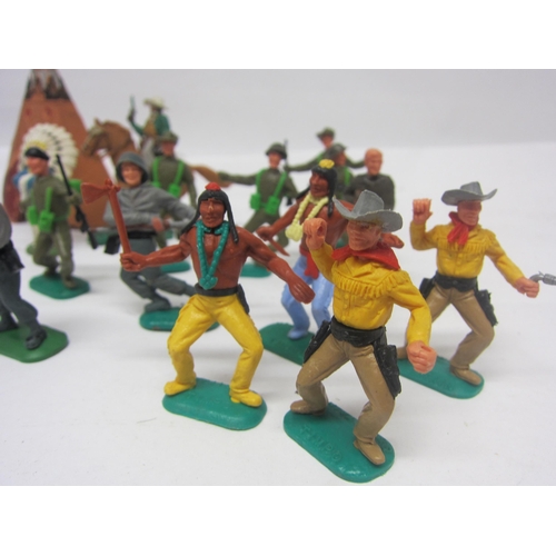 8377 - A collection of Timpo, Britains and Herald plastic figures including soldiers, cowboys, Native Ameri... 