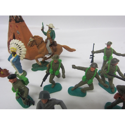 8377 - A collection of Timpo, Britains and Herald plastic figures including soldiers, cowboys, Native Ameri... 