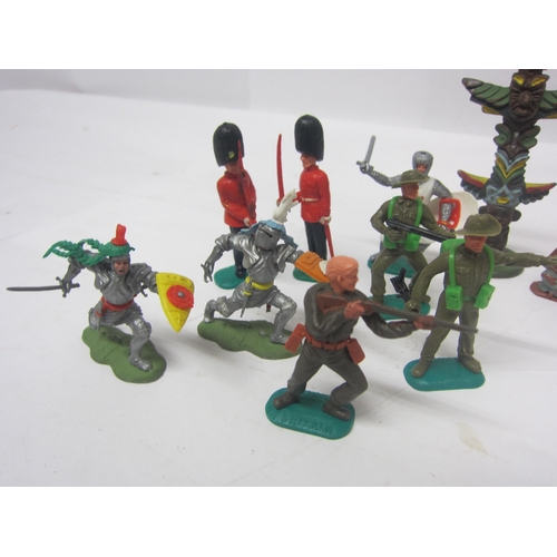 8377 - A collection of Timpo, Britains and Herald plastic figures including soldiers, cowboys, Native Ameri... 