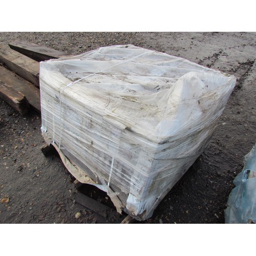 3236 - A pallet of unused metallic ceramic slabs