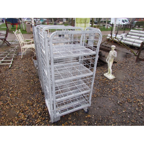 3281 - An aluminium four tier wheeled trolley