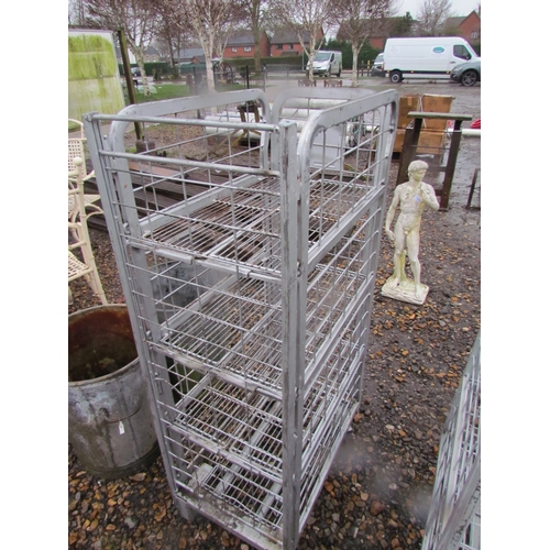 3282 - An aluminium four tier wheeled trolley