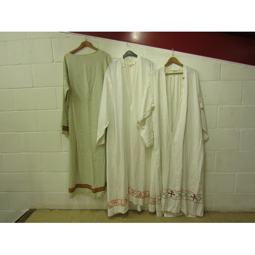 1049 - Five white linen and cotton religious surplices, two with bands of Greek key design