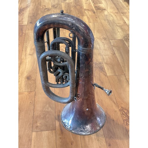 1069 - A 1920's Boosey & Co. tuba in E flat, for restoration including dents to bell           (R) £50