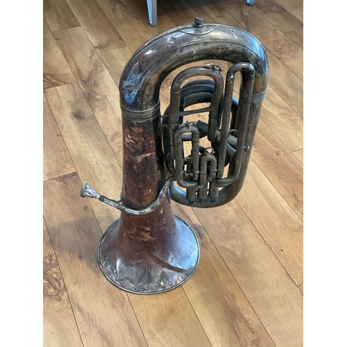 1069 - A 1920's Boosey & Co. tuba in E flat, for restoration including dents to bell           (R) £50