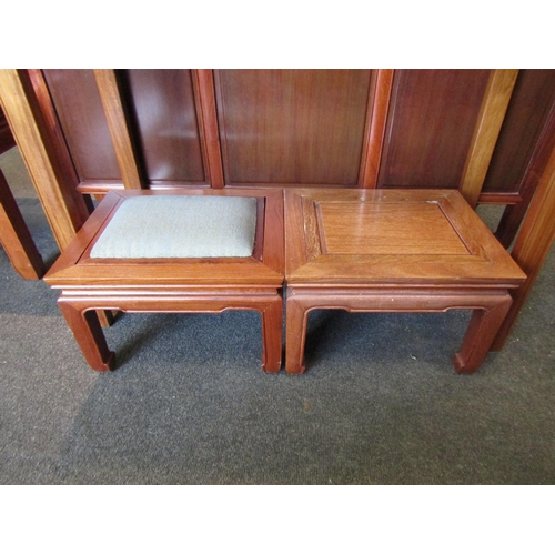 1123 - A pair of Chinese elm foot stools/tables (with reversable seats)