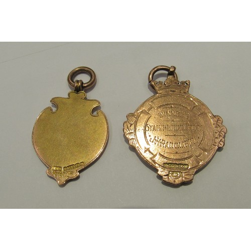 9212 - Two 9ct gold Football medals, 22g