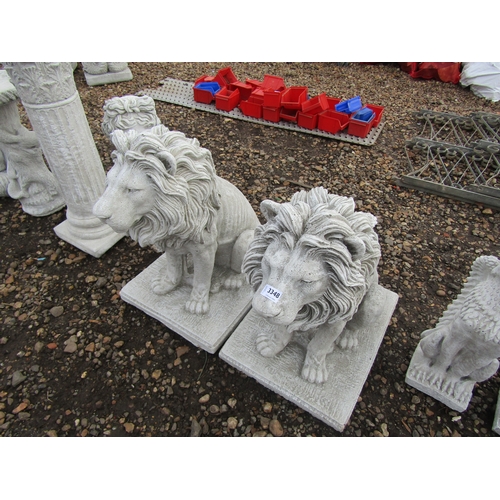 3348 - A pair of large composition seated lions  (E)  £60-80