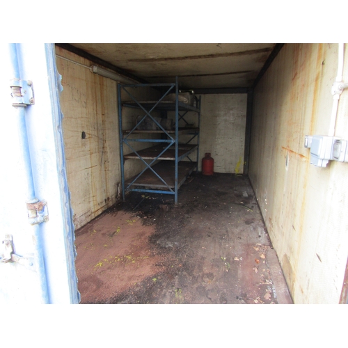 3410 - A shipping container approx 20' x 8' with racking  (E)  £500-600