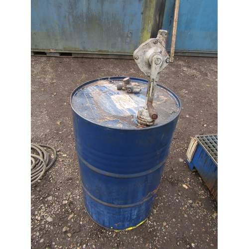 3418 - A metal drum containing 10w/40 oil