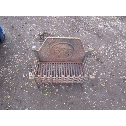 3421 - A cast iron fire grate with back