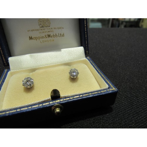 9138 - A pair of diamond stud earrings, 1.50-2ct total approx, 6mm diameter x 4mm deep