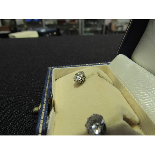 9138 - A pair of diamond stud earrings, 1.50-2ct total approx, 6mm diameter x 4mm deep