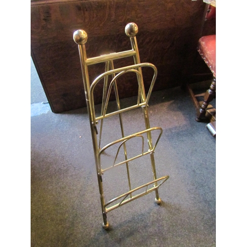 1009 - A country house/hotel brass newspaper stand, 84cm tall