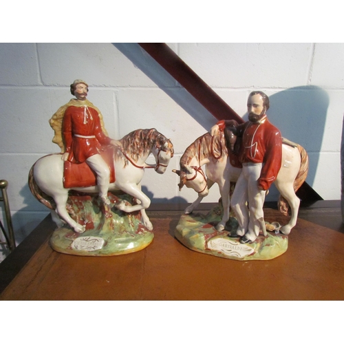 1015 - Two large Staffordshire figures, Garibaldi and Victor Emanuel, one a/f, 36cm x 39cm tall