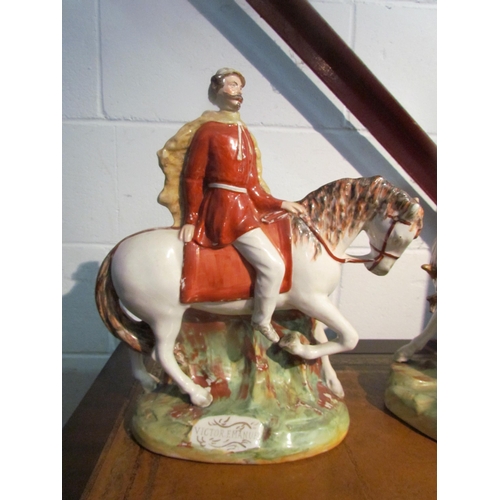 1015 - Two large Staffordshire figures, Garibaldi and Victor Emanuel, one a/f, 36cm x 39cm tall