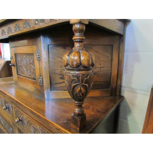 1017 - An Old Charm style oak court cupboard, fluted and carved cup and cover supports, 134cm tall x 122cm ... 