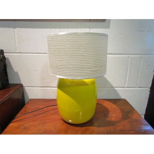 1029 - A Habitat table lamp base in acid yellow with shade