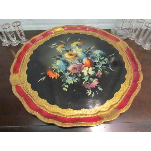 1035 - An Italian ornate scalloped form tray with hand painted flowers, 44cm diameter, together with six fl... 