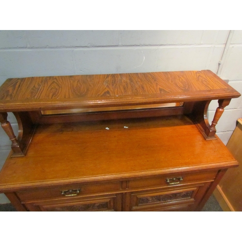 1048 - A circa 1900 walnut mirror back sideboard, the raised back over two drawer and two door cupboard bas... 