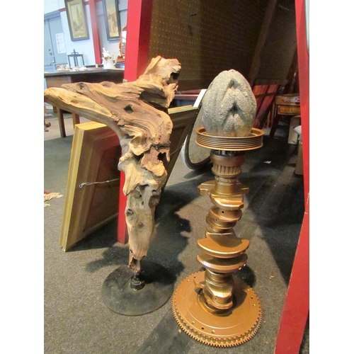 1059 - An engine crankshaft converted into a stand, together with a gnarled wood feature on plinth base (2)