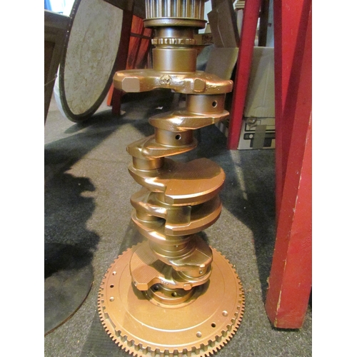 1059 - An engine crankshaft converted into a stand, together with a gnarled wood feature on plinth base (2)