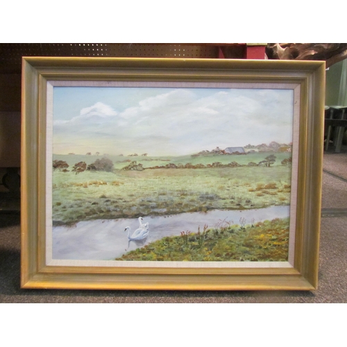 1062 - K.J. JENNINGS: An oil on board of swans on a river, signed lower right, framed, 41cm x 57cm image si... 