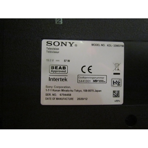 1076 - A Sony KDL-32WD756 television with power supply and instructions