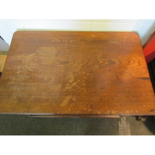 1088 - A late Victorian oak two tier serving table with spindle detail raised on castors, stains to top, 63... 