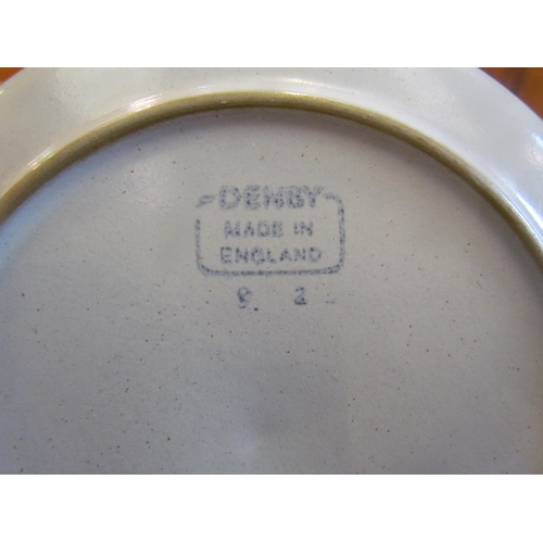 1094 - An eight piece place setting of Denby 