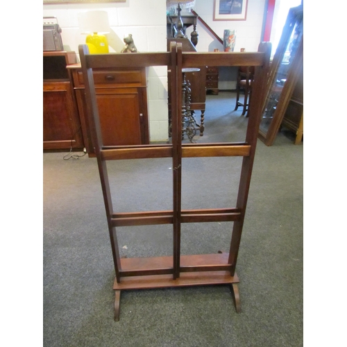 1100 - An Edwardian mahogany clothes airer, 99cm tall