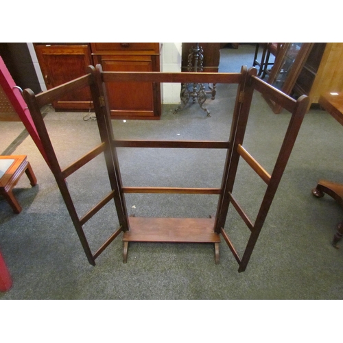 1100 - An Edwardian mahogany clothes airer, 99cm tall