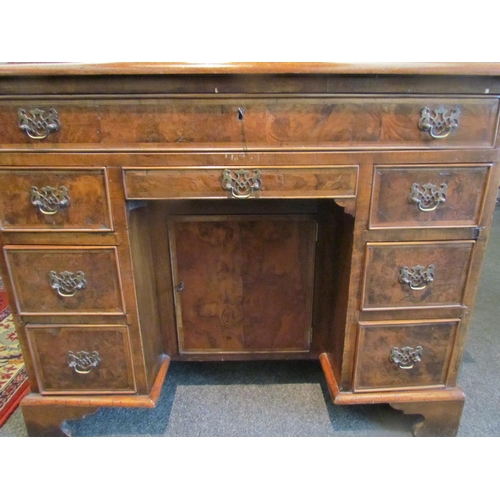 1131 - A child's small kneehole desk, veneered walnut, approximately 18th Century, 71cm tall x 87cm wide x ... 