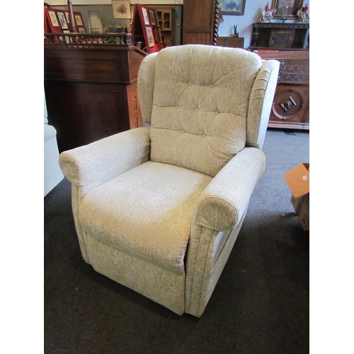 1133 - A modern electric reclining armchair, buttoned upholstery, with power supply