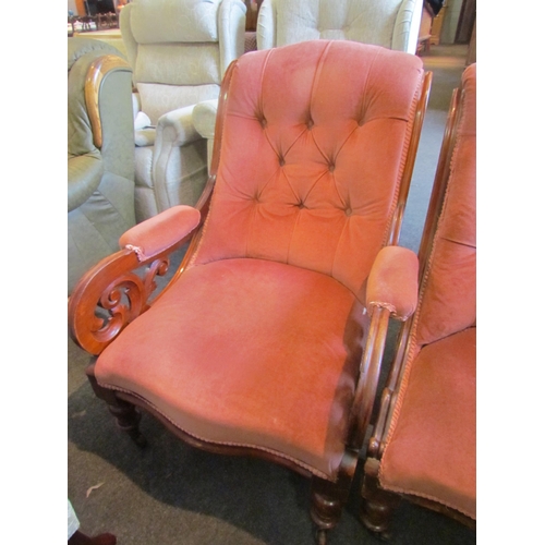 1134 - A pair of Victorian button back his and hers armchairs with rose pink velvet upholstery, both a/f   ... 