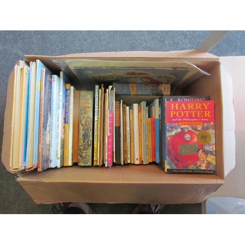 1149 - A box of assorted children's and illustrated books, including J.K. Rowling Harry Potter, Puffin Pict... 