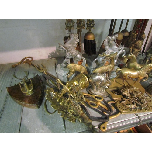 1198 - A selection of metal wares to include front door bell pull, decorative brass dragon hook, brass anim... 