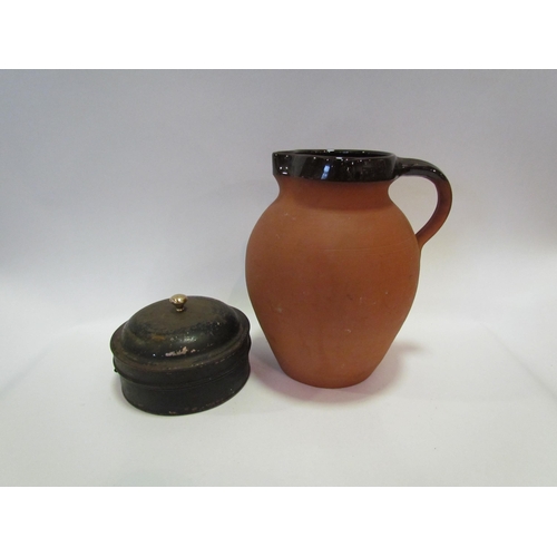 1217 - A Victorian spice tin and a Brannam Royal Barum Ware terracotta jug, 26cm tall